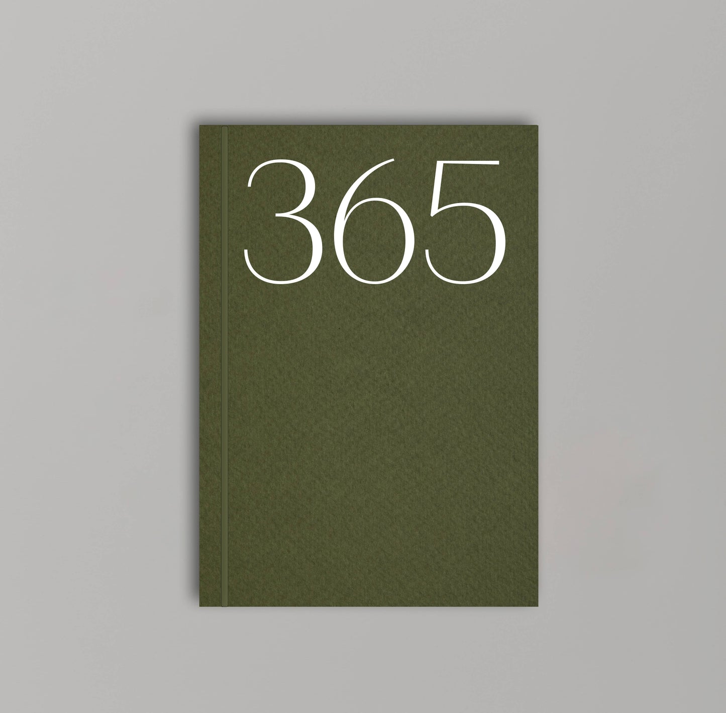 Moss green undated planner with large ‘365’ in white typeface on textured cover – minimal, modern daily planner printed in the UK.