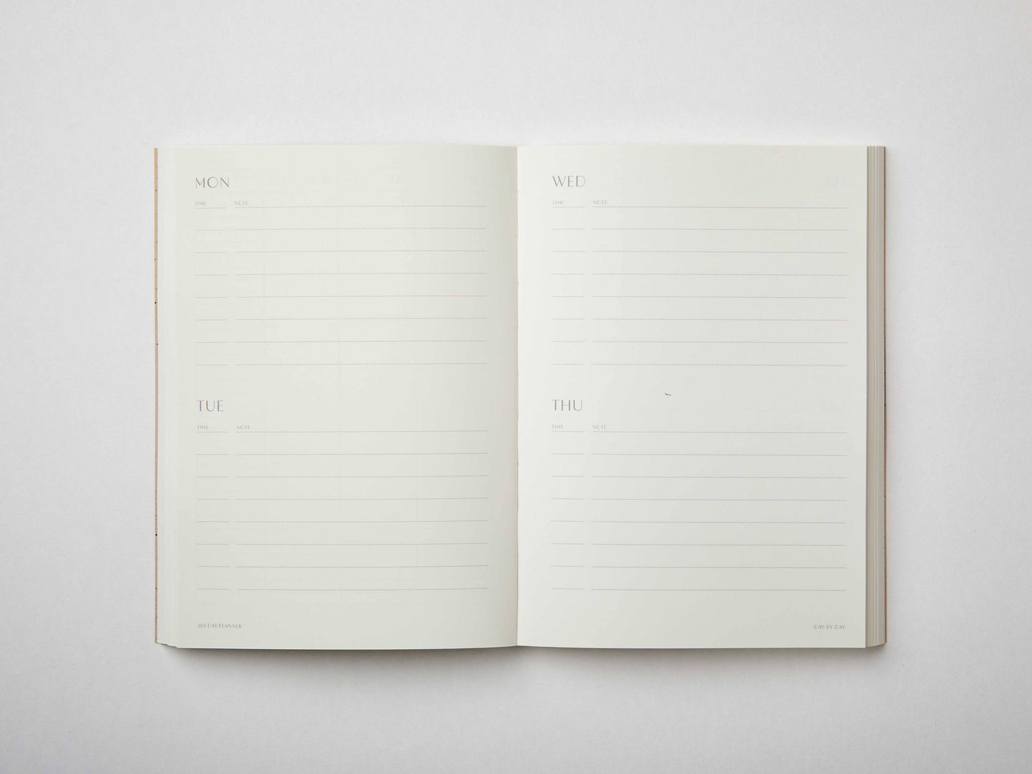 Moss green undated planner with large ‘365’ in white typeface on textured cover – minimal, modern daily planner printed in the UK.