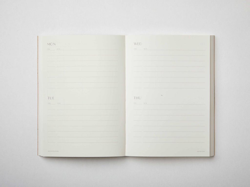 Moss green undated planner with large ‘365’ in white typeface on textured cover – minimal, modern daily planner printed in the UK.