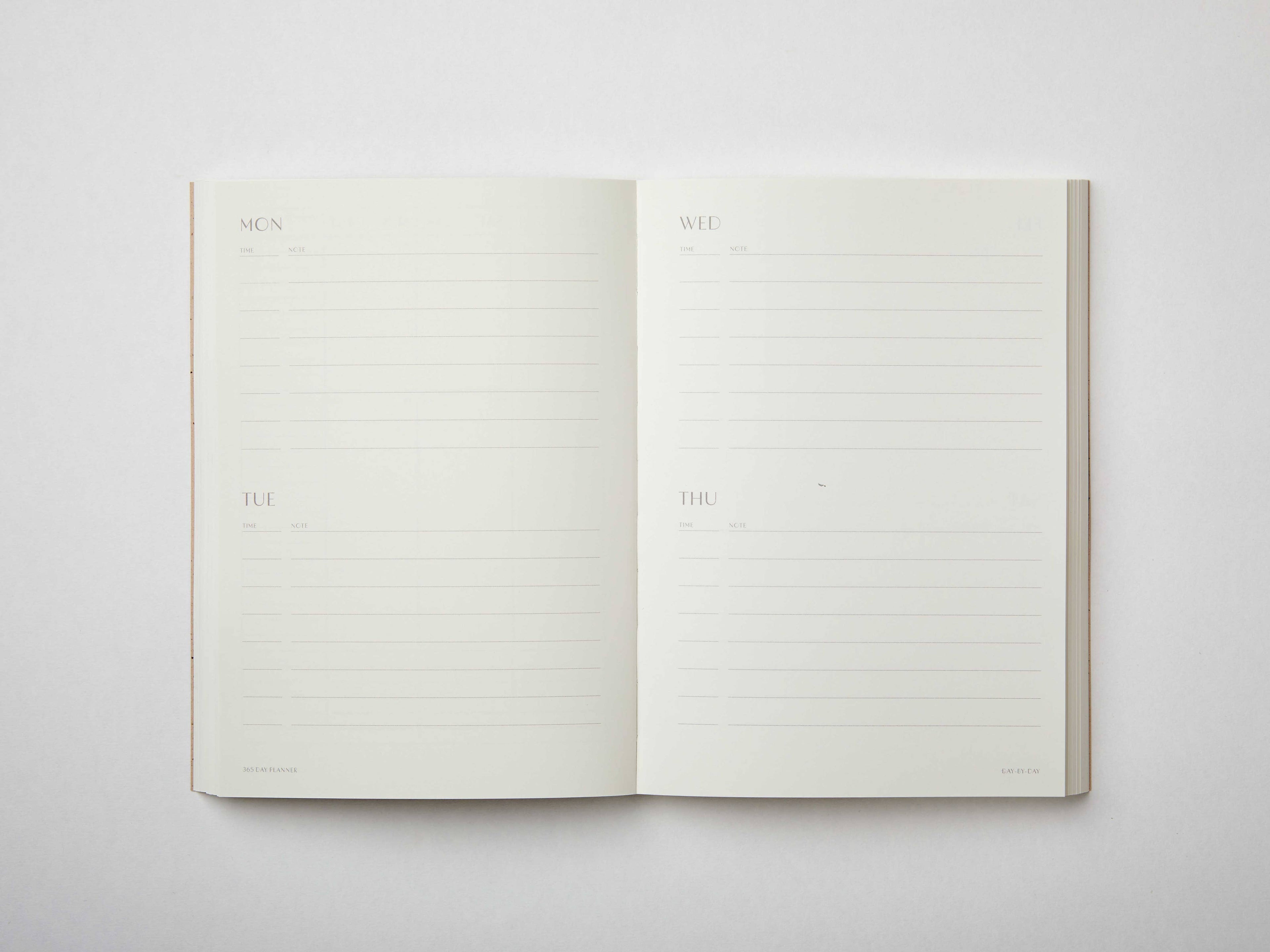 Moss green undated planner with large ‘365’ in white typeface on textured cover – minimal, modern daily planner printed in the UK.